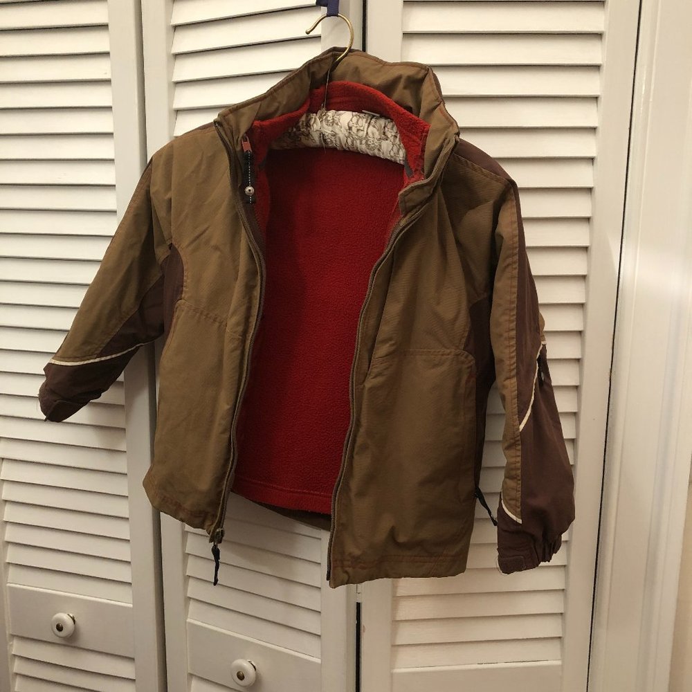 REI boy's brown jacket with removable fleece lining, folding hoodie, 6/7